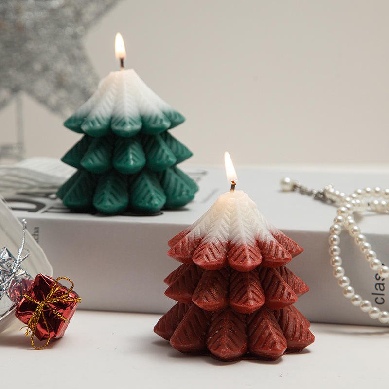 H65d5f65f1bc44755bef631ab897978b57 Mini Christmas Tree Scented Candles - Image 1